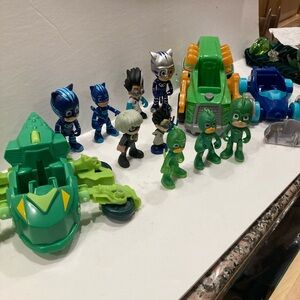 PJ Masks Toy lot of 9 Action Figures with 3 different Green and Blue Vehicles